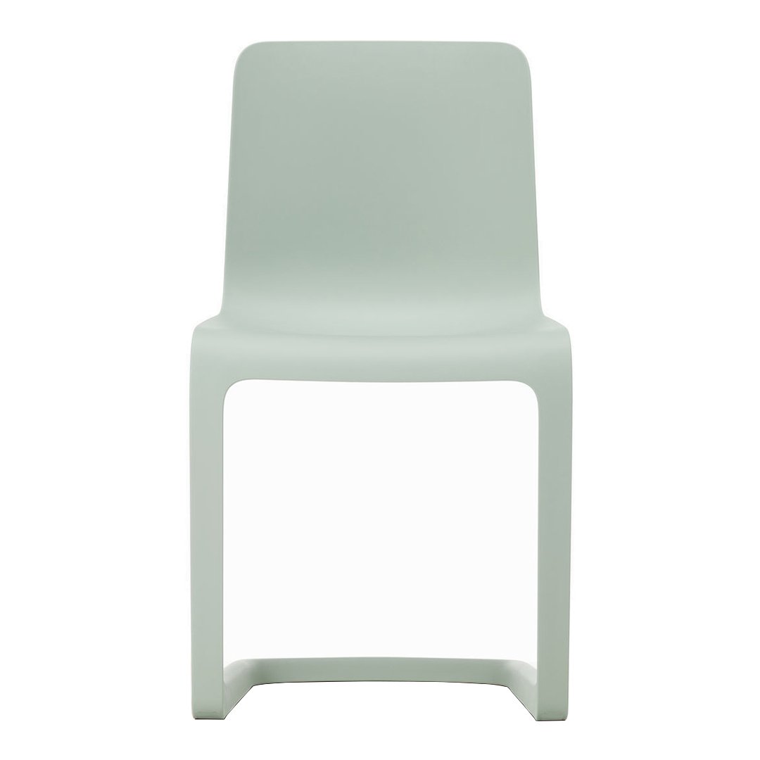 Light pastel green chair with a minimalist design and smooth, solid surface, perfect for modern decor.