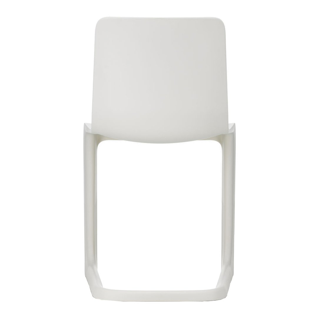 Minimalist white chair with smooth, clean lines and a simple, modern design, perfect for contemporary spaces.
