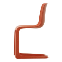 Modern orange chair with sleek, curved design and minimalistic profile, perfect for contemporary decor.