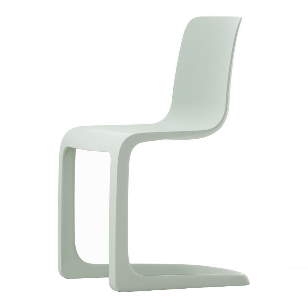 Minimalist mint green chair with smooth curves and a sleek, modern design. Ideal for contemporary decor.