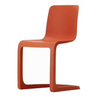 Modern orange chair with a sleek, minimalist design and smooth, matte finish. Perfect for contemporary interiors.