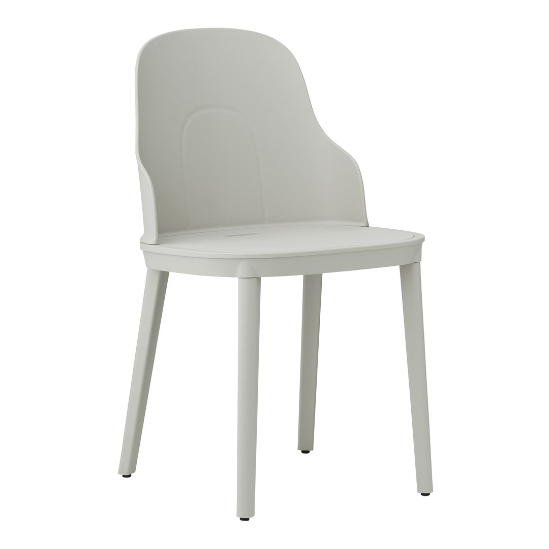 Light gray plastic chair with a sleek design and smooth, curved edges. Ideal for modern home decor.