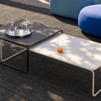 Stylish two-tone coffee table featuring a sleek black and white design with smooth surfaces and modern aesthetics.