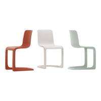 Set of three sleek modern chairs in coral, white, and soft mint green, showcasing a minimalist design.