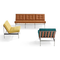Stylish seating set featuring a brown tufted sofa, yellow couch, and teal accent chair with sleek metallic frames.