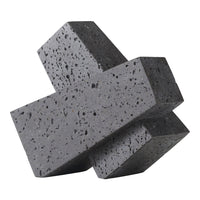 Sleek gray geometric sculpture with textured, speckled finish and angular design. Perfect for modern decor.