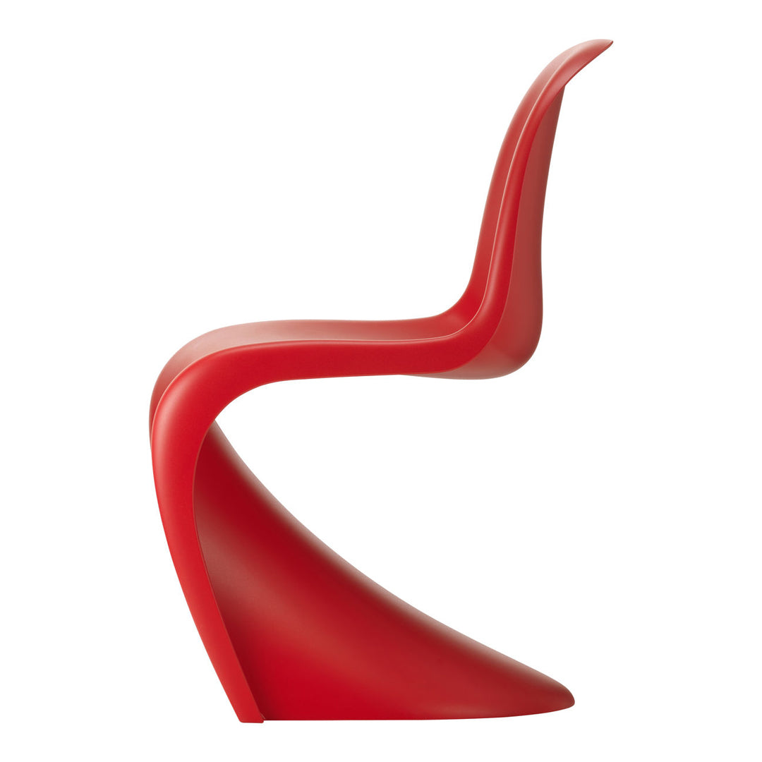Sleek red plastic chair with a smooth, curved design, perfect for modern and contemporary decor.