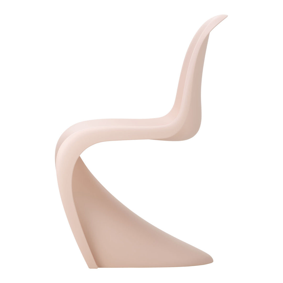 Stylish pink curve chair with a smooth finish, showcasing a minimalist design and soft, modern elegance.