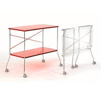 Red tabletop with chrome legs, featuring a modern design and clean lines. Ideal for contemporary spaces.