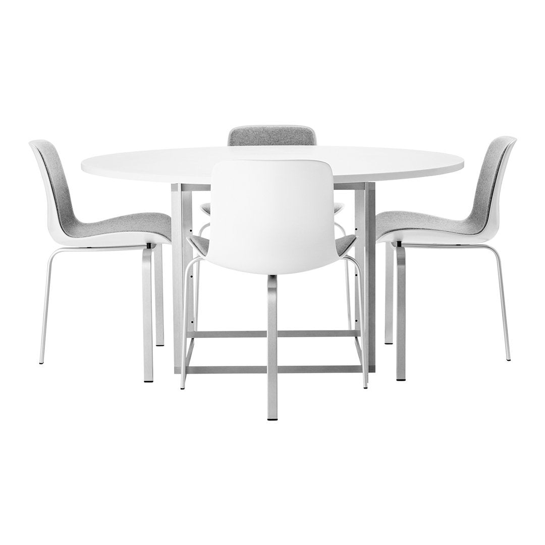 Round white dining table with five sleek white chairs featuring soft gray accents and a minimalist design.