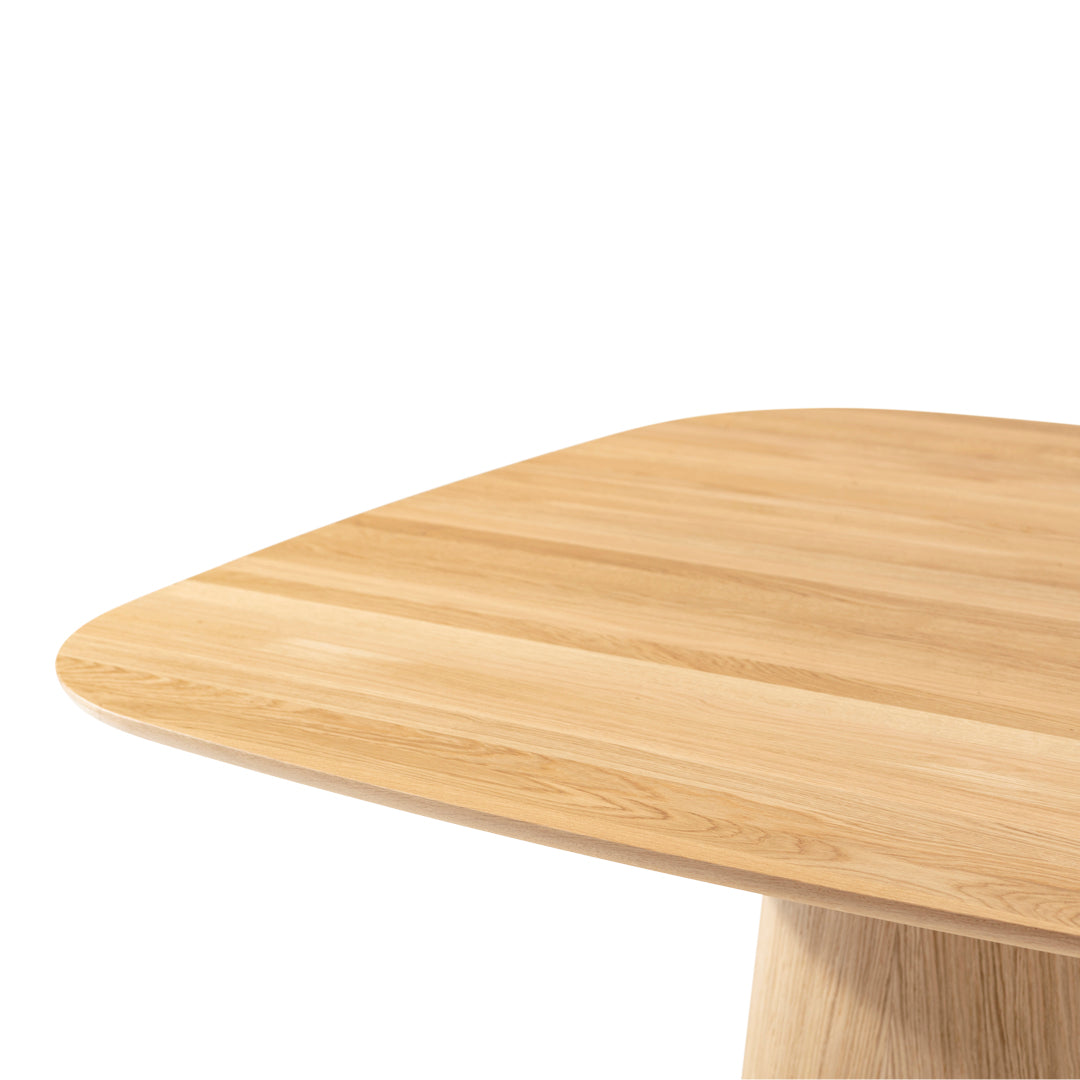 Light oak wood tabletop with smooth, natural grain patterns and rounded edges. Ideal for modern home decor.