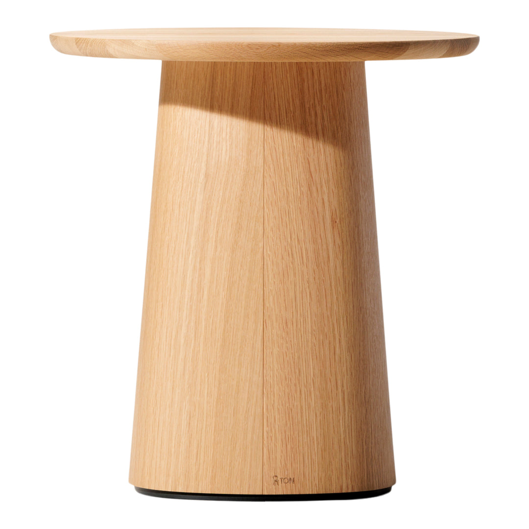 Light wood side table with a smooth, natural grain and a minimalist design, featuring a rounded top and tapered base.