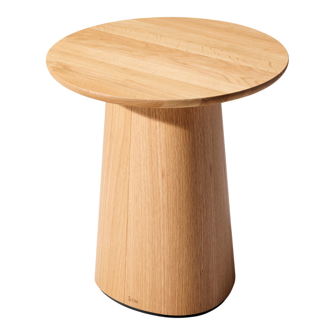 Natural oak wood side table featuring a smooth circular top and tapered base in a light, warm finish.