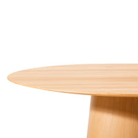 Light wood round table with a smooth finish and natural grain patterns, perfect for modern decor.