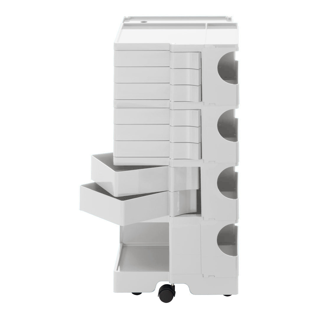 White multi-drawer storage unit with a sleek design and smooth, minimalist finish, featuring rounded openings on drawers.