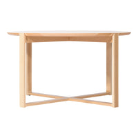 Natural light wood table with a smooth surface and minimalist design, featuring a clean, modern aesthetic.
