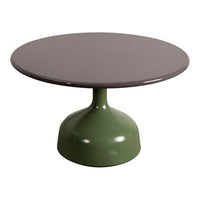 Round coffee table with a brown top and a green base, featuring a sleek, modern design. Perfect for contemporary spaces.