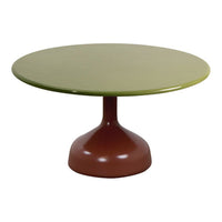 Round table with a vibrant green top and a rich brown pedestal base, featuring a modern, sleek design.