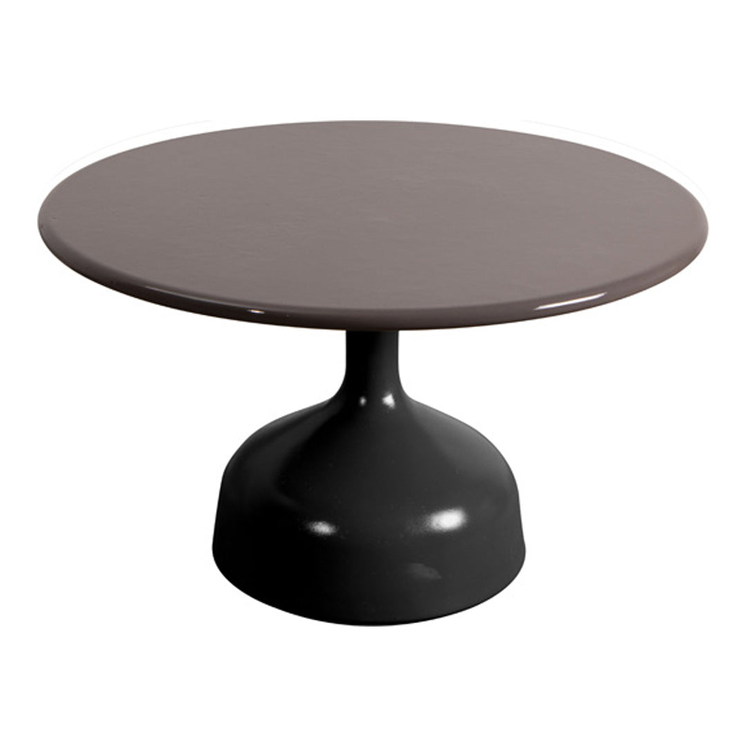 Round coffee table featuring a glossy brown top and a sleek black pedestal base, minimalist design.