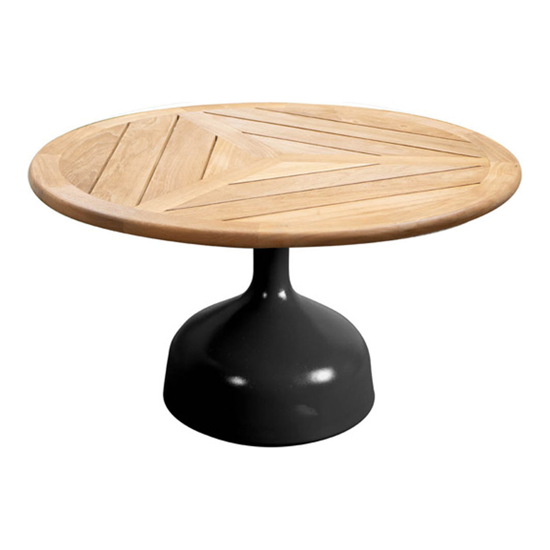Round wooden table with a natural pattern and a sleek black pedestal base. Perfect blend of modern and rustic styles.