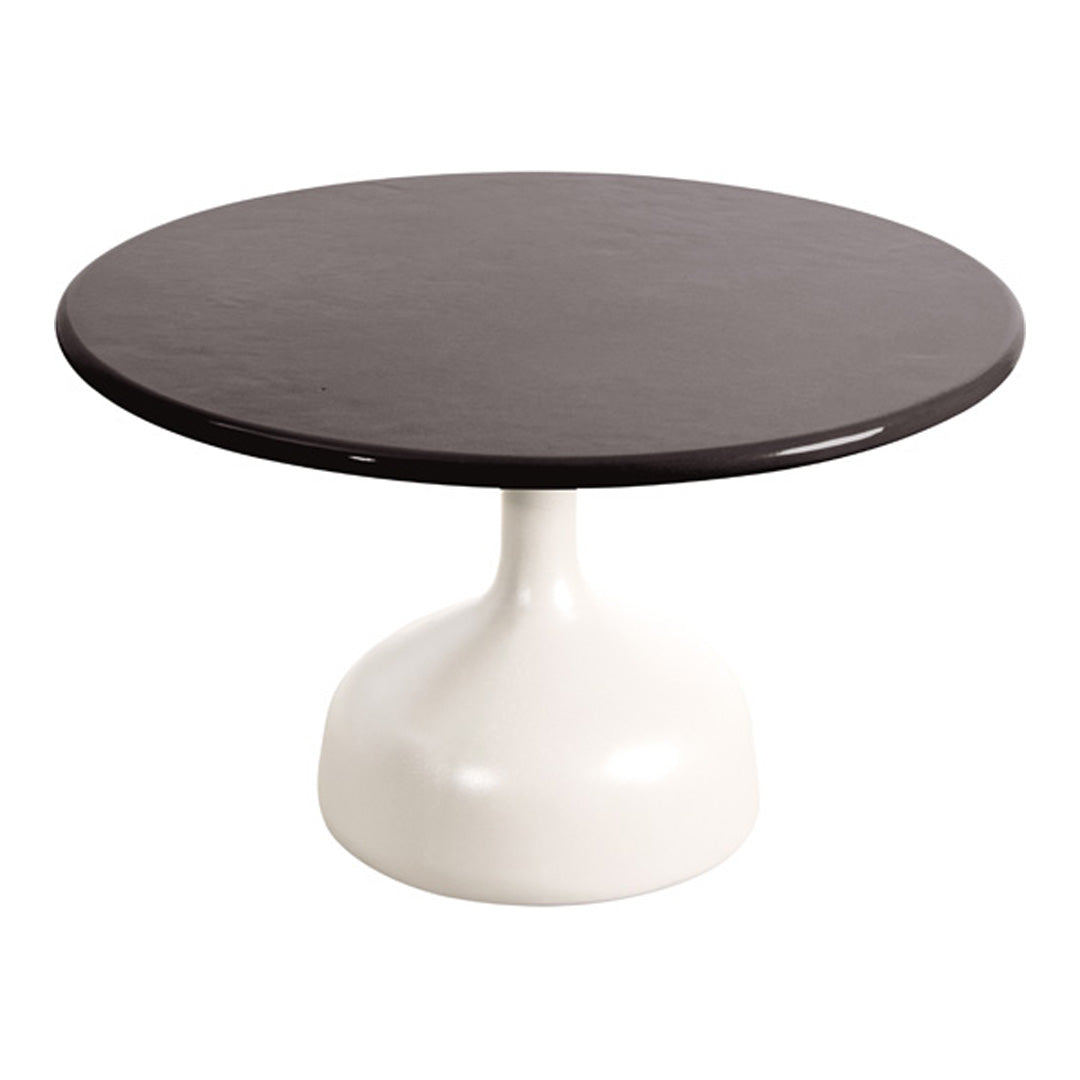 Round table with a sleek dark brown top and a smooth white pedestal base, perfect for modern decor.