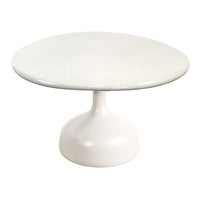 Round white dining table with a glossy finish and a sleek pedestal base. Perfect for modern interiors.