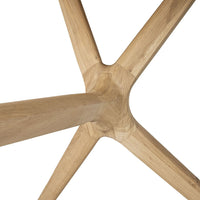 Light oak wooden table base with a smooth finish, featuring a geometric star pattern in natural tones.