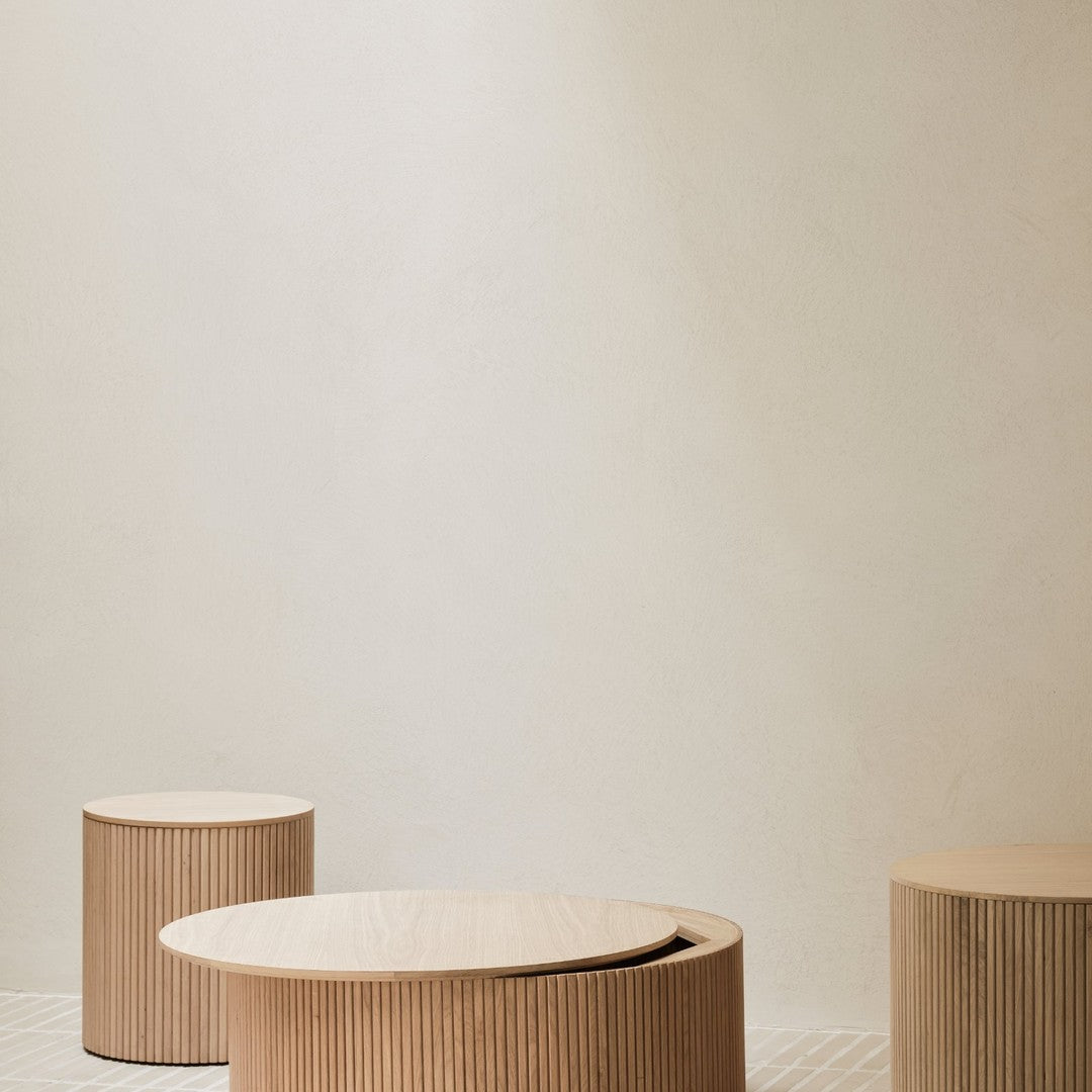 Light wood coffee tables with vertical grain patterns on a neutral background. Modern and minimalistic design.