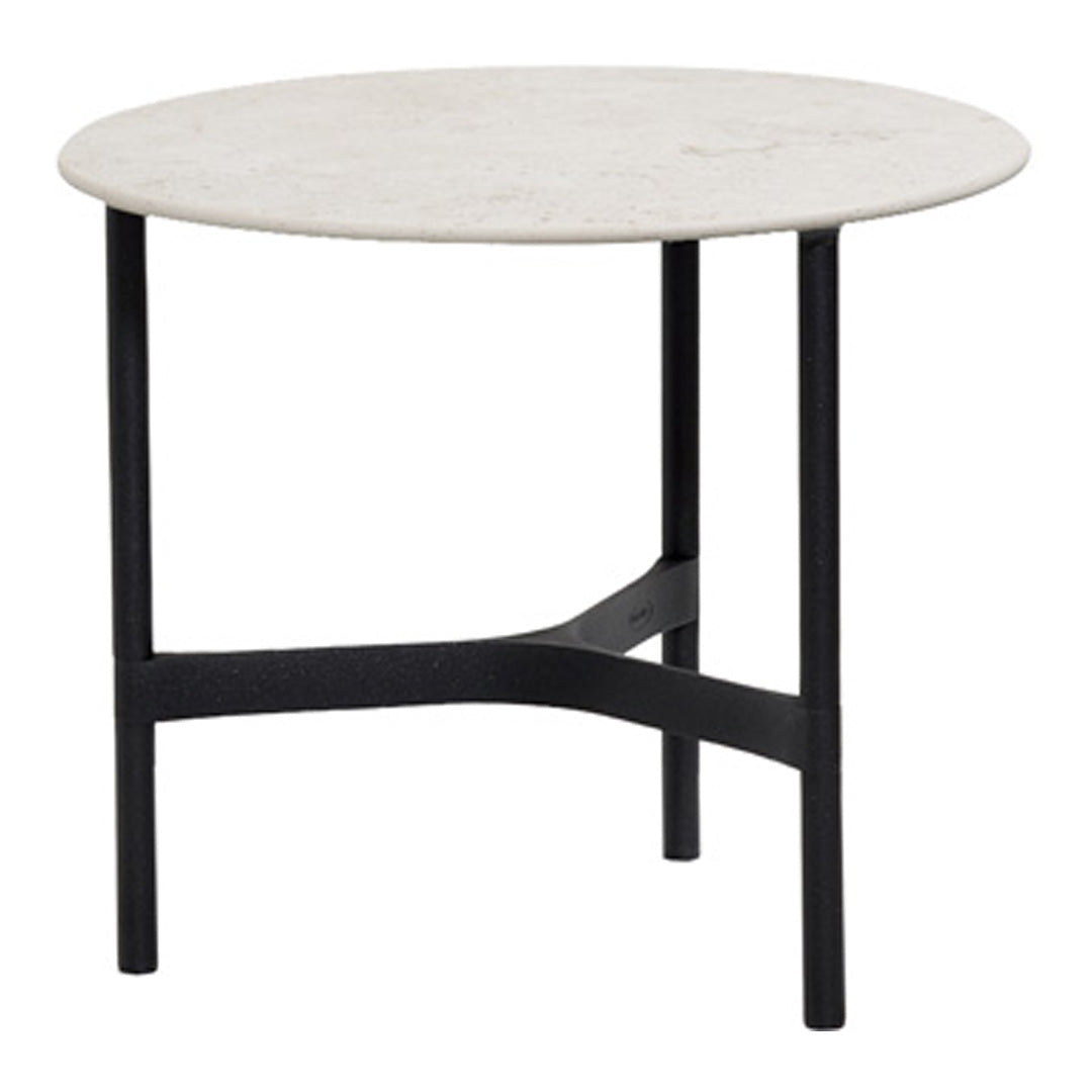 Round white marble top side table with sleek black metal legs and minimalistic design.