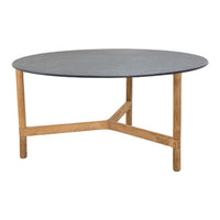 Round table with a sleek dark gray top and natural wood legs, highlighting a modern and minimalist aesthetic.