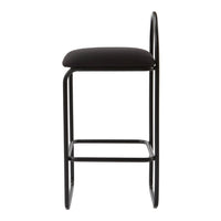 Modern black bar stool with a simple design and upholstered seat, featuring a sleek metal frame. Perfect for contemporary spaces.