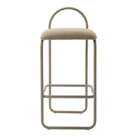 Beige upholstered stool with a minimalistic metal frame and subtle texture. Modern design for any decor.