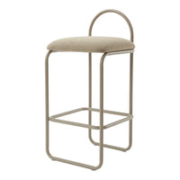 Beige upholstered bar stool with a minimalist metal frame in light taupe. Simple, modern design with no visible patterns.