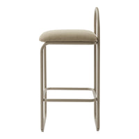 Beige upholstered bar stool with a minimalist metal frame in soft taupe. Simple and modern design.