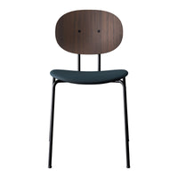 Modern chair featuring a dark wood backrest, sleek black legs, and a deep blue upholstered seat. Stylish and minimalist design.