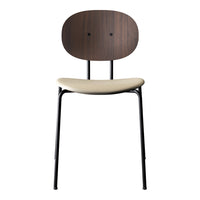 Modern chair featuring a dark wood backrest, cream seat, and sleek black metal legs for a stylish contrast.