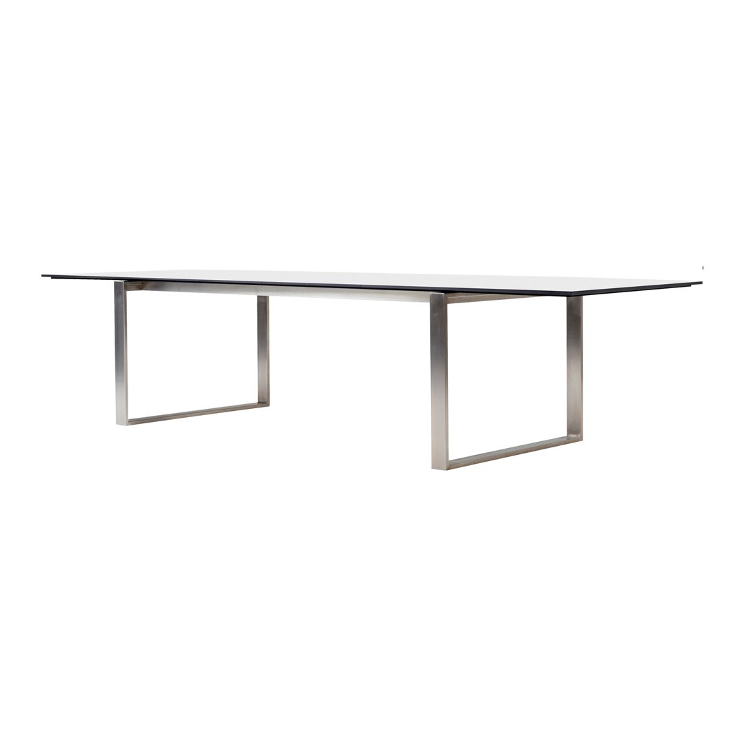 Rectangular glass table with a sleek silver metal frame, featuring a minimalist design and clean lines.