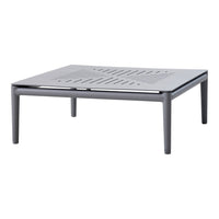 Gray metal coffee table with a slatted pattern and minimalist design, ideal for modern outdoor or indoor settings.
