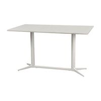 Stylish white rectangular table with a smooth surface and sleek metallic legs for a modern look.