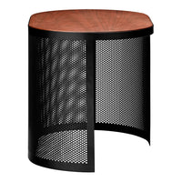 Round table with a warm wood top and a sleek black perforated metal base, featuring intricate mesh patterns.