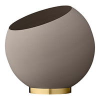 Round ceramic lamp with a matte taupe finish, dark brown top, and glossy gold base. Stylish and modern design.