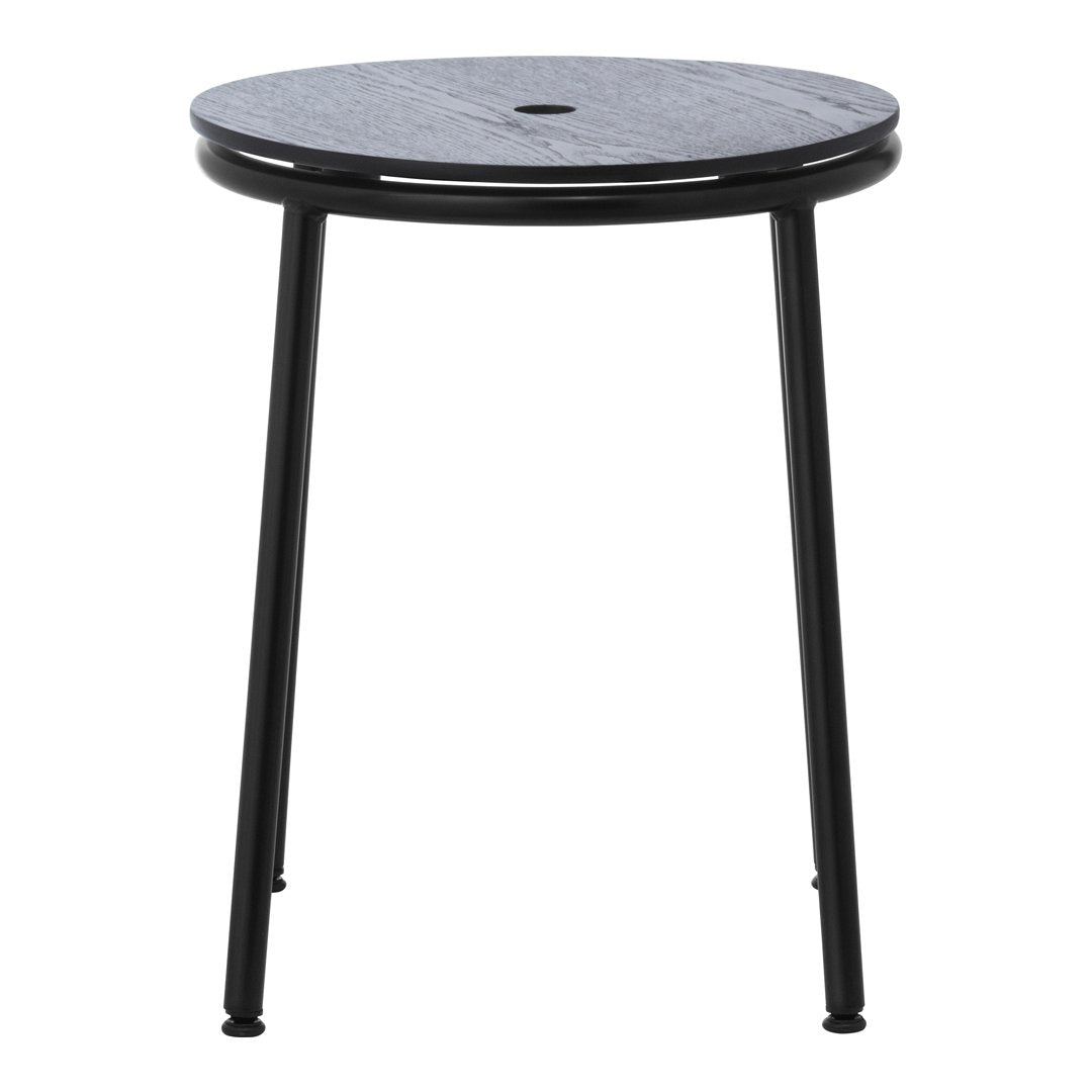 Black metal side table with a textured blue circular top and sleek legs, ideal for modern decor.