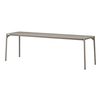 Modern gray metal table with a sleek, minimalistic design, featuring clean lines and a smooth surface.