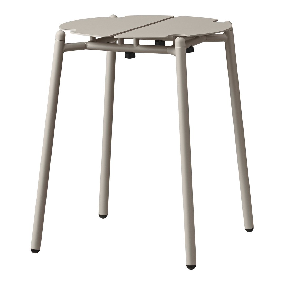 Light beige, minimalist design folding stool with a smooth, matte finish and simple round pattern.
