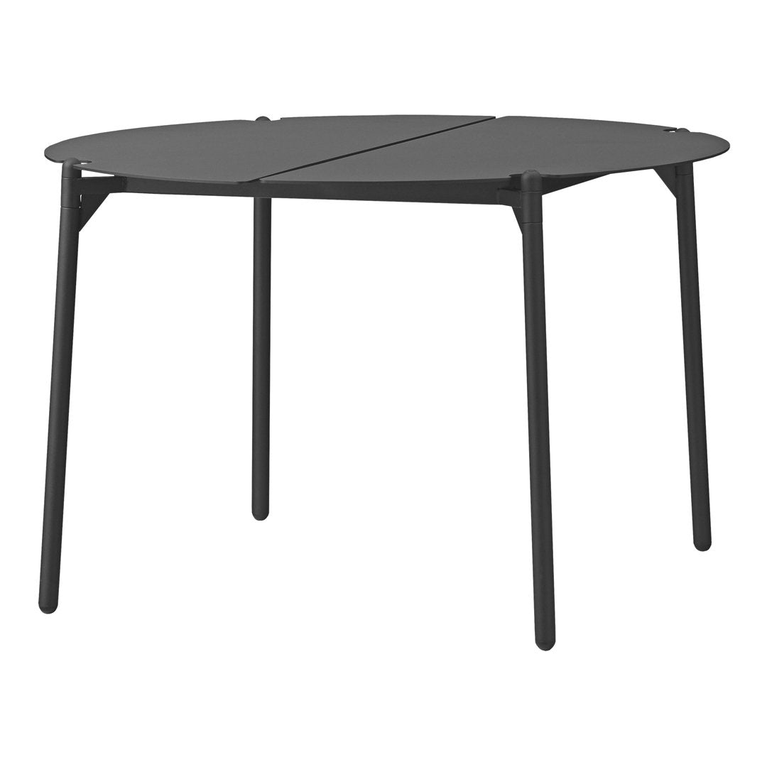 Black round table with a sleek, minimalist design and smooth surface, perfect for modern decor.
