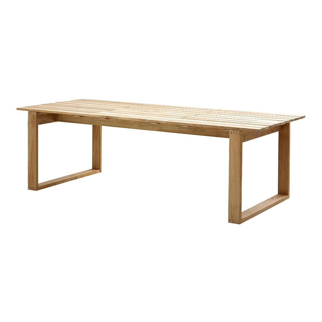 Natural wood dining table with a smooth, light brown finish and a minimalist design. Perfect for modern decor.