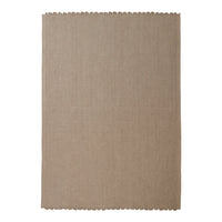 Beige linen placemat with a textured surface and scalloped edges. Perfect for elegant dining decor.