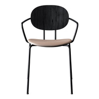 Stylish black metal chair with a smooth beige seat and oval backrest design, perfect for modern interiors.