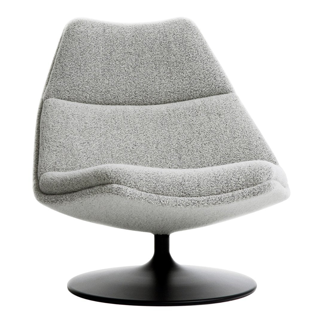 Modern gray swivel chair with a soft, textured finish and sleek black base, featuring smooth, curved lines.