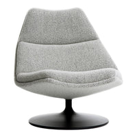 Modern gray swivel chair with a soft, textured finish and sleek black base, featuring smooth, curved lines.
